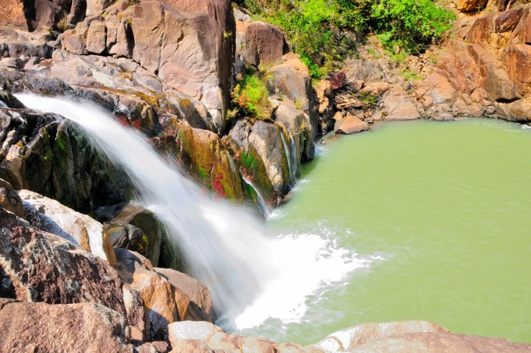 A waterfall surrounded by greenery near Netarhat in Latehar district
